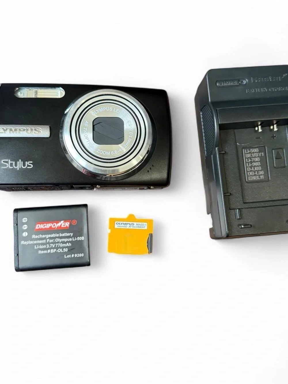 Olympus Stylus 1010 10.1MP Black Digital Camera w Battery Charger Memory SD Card